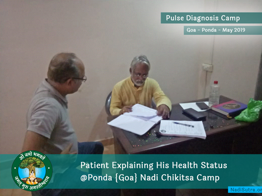 Patient Explaining Health to Shri Sivanandan ji at Goa Camp